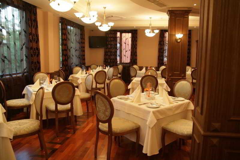 Hotel Club Central خيساريا المطعم الصورة